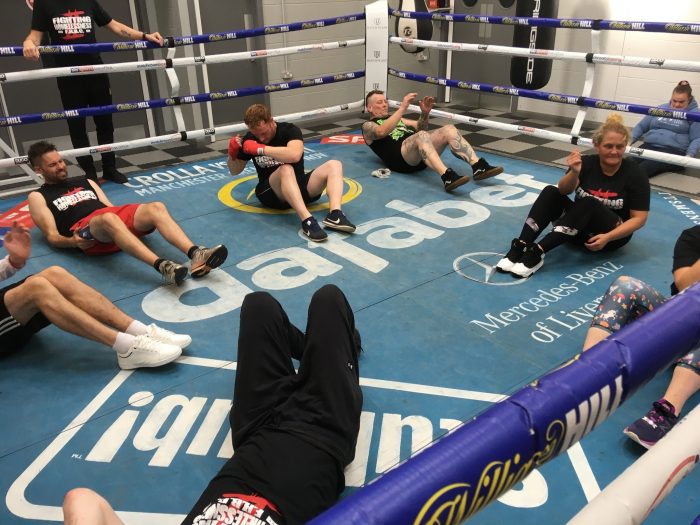 Clients in boxing ring taking part in the Fighting Homelessness Fitness Programme