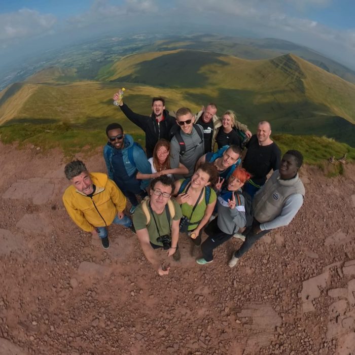 Clients and Diversionary Activities Team at the peak of Pen Y Fan